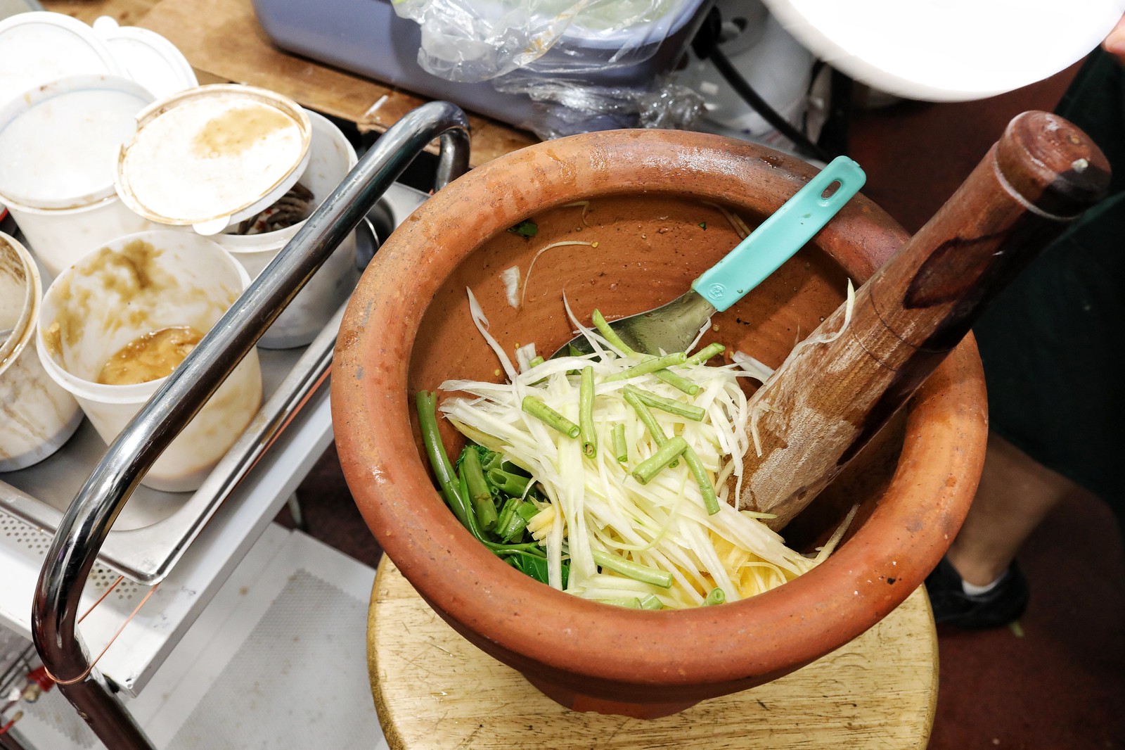 A mortar and pestle with jicama
