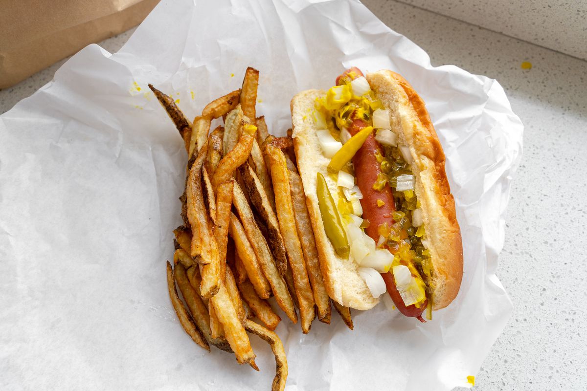 Chicago dog with fries.
