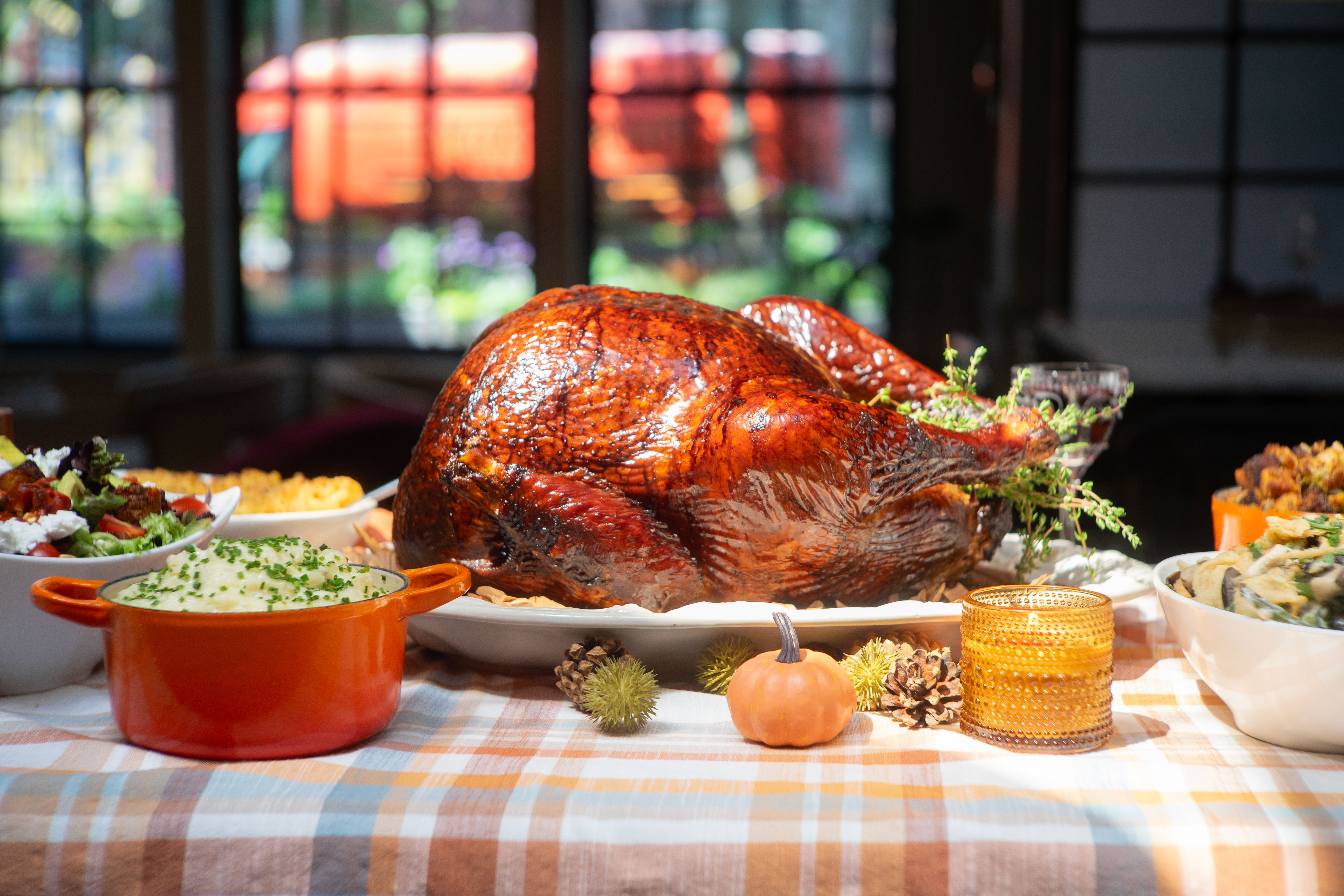 A smoked turkey on a Thanksgiving table.